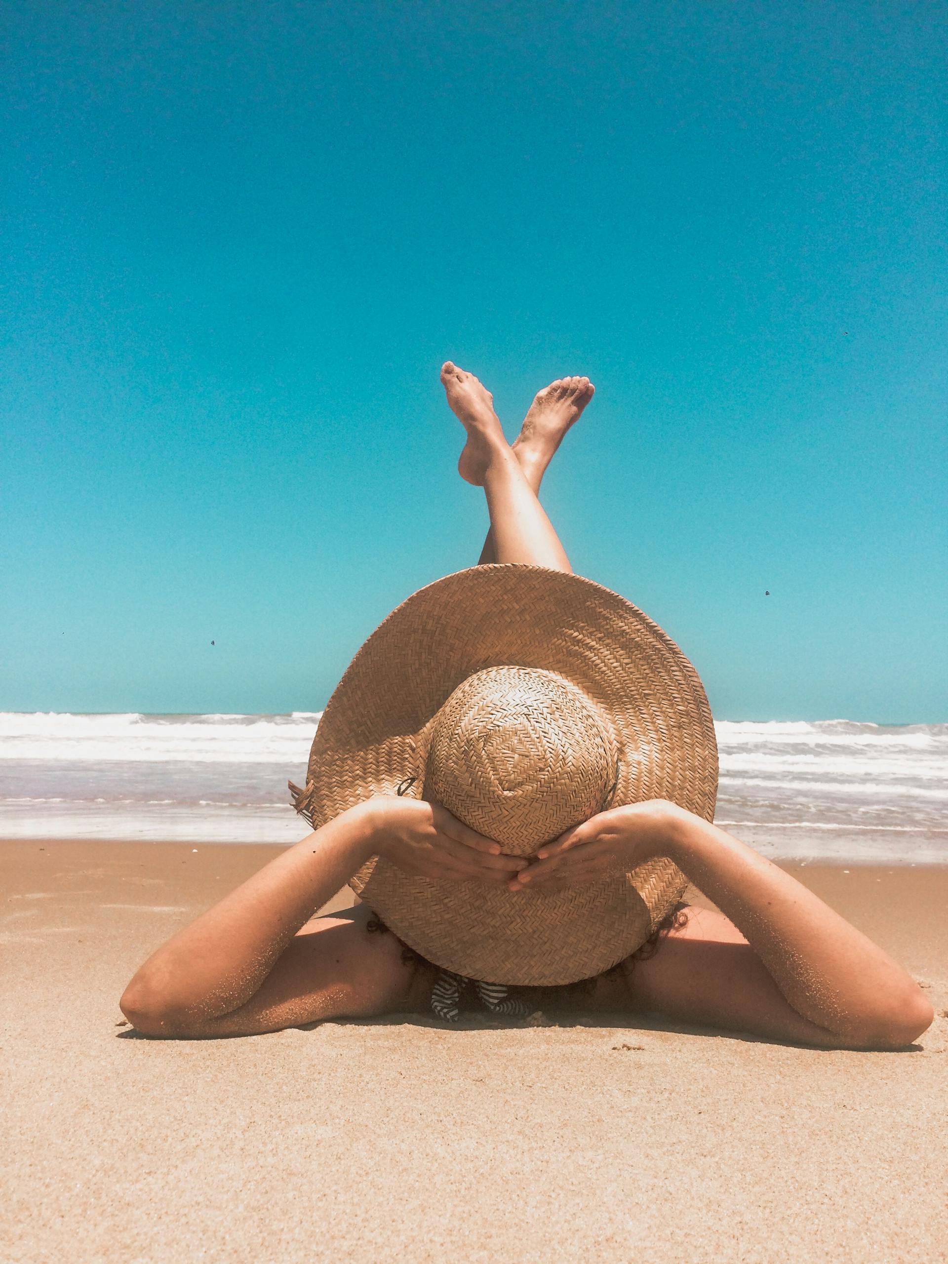 Person Laying On Sand